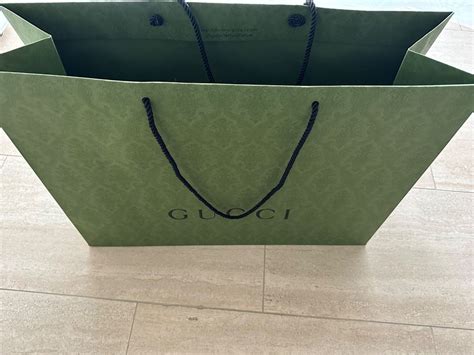 sac papier gucci|Meer.